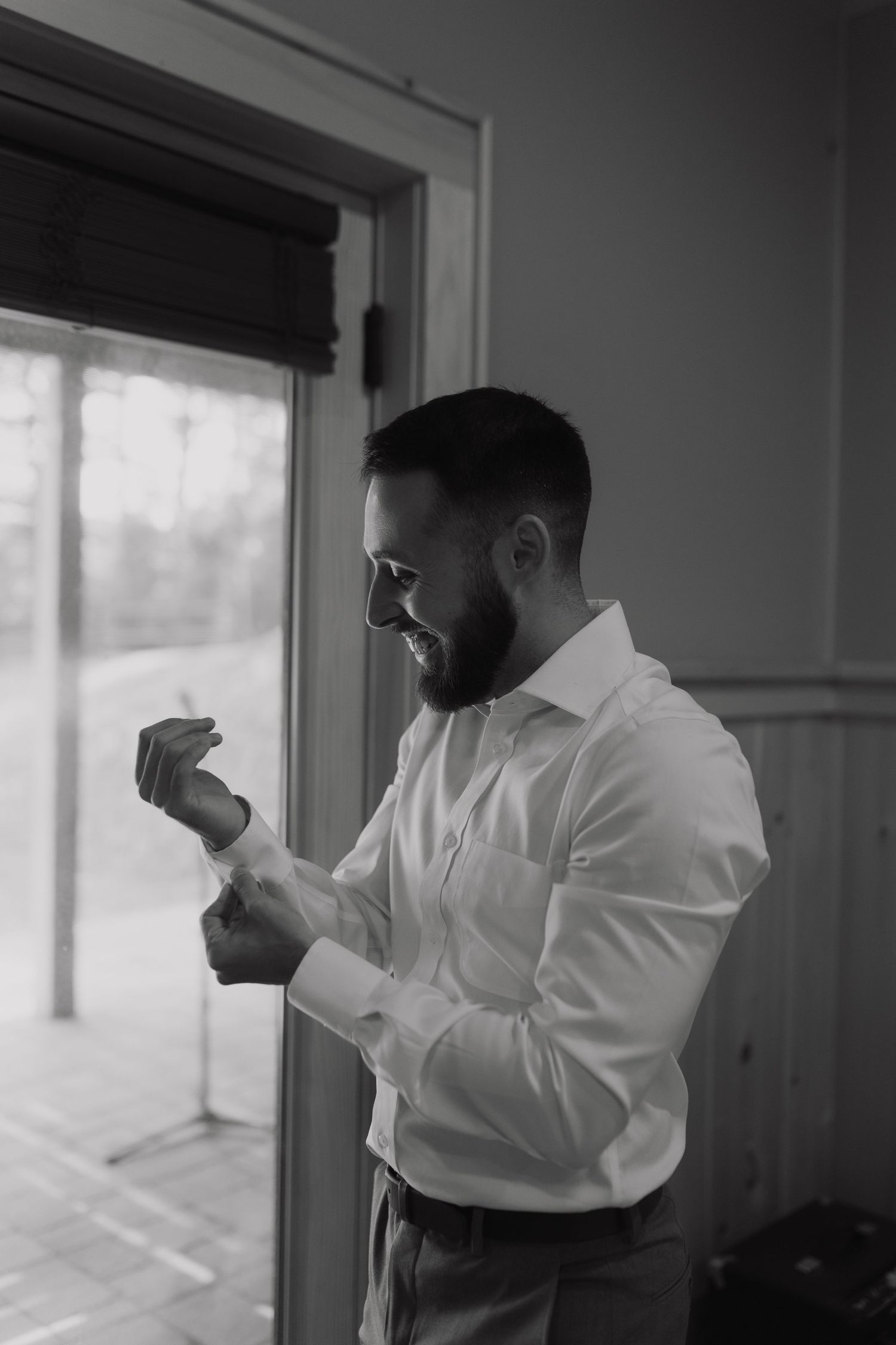A person in a white shirt drinking from a coffee cup in silhouette, shown in four sequential black and white frames.