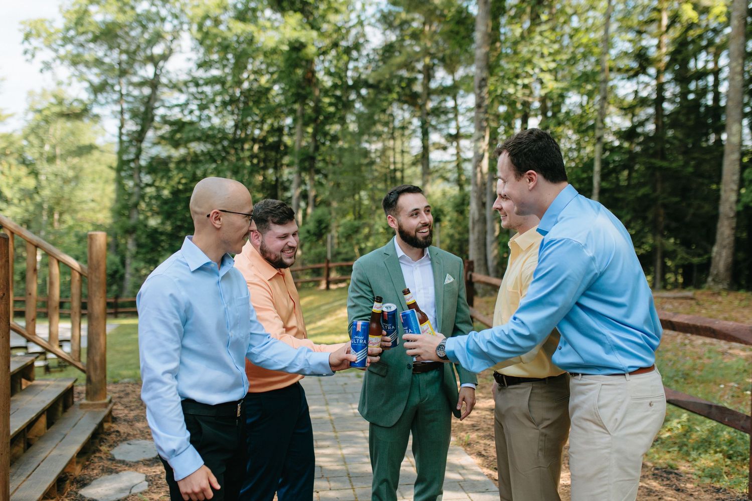 Six sequential photos showing people engaging in social conversation at a casual outdoor gathering among trees.