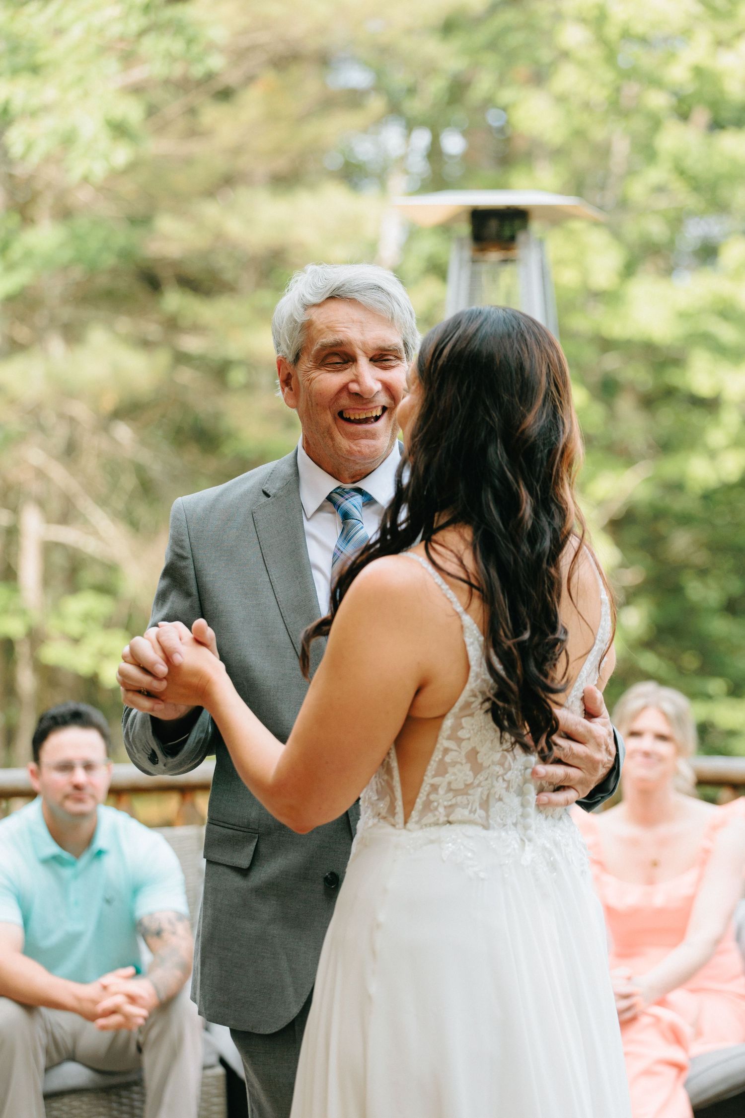 A tender dance moment at an outdoor wedding celebration captured in sequence.