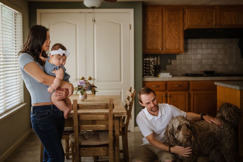Casual lifestyle photography session in a cozy home kitchen setting.