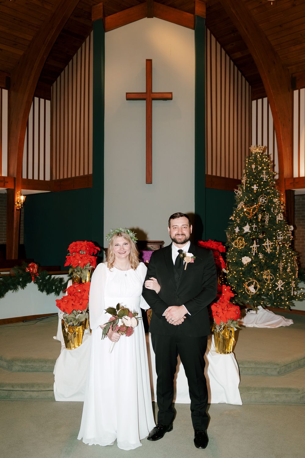 A wedding ceremony progression shown in four sequential photos inside a church decorated with red flowers and crosses. Carolina Beach, NC