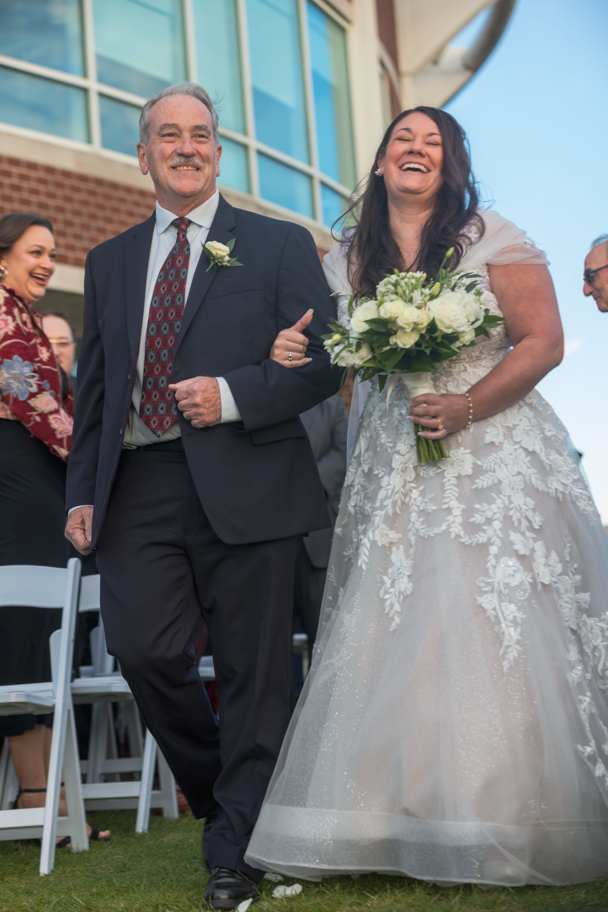 A sequence of wedding photos showing joyful moments during an outdoor ceremony with a brick building backdrop.
