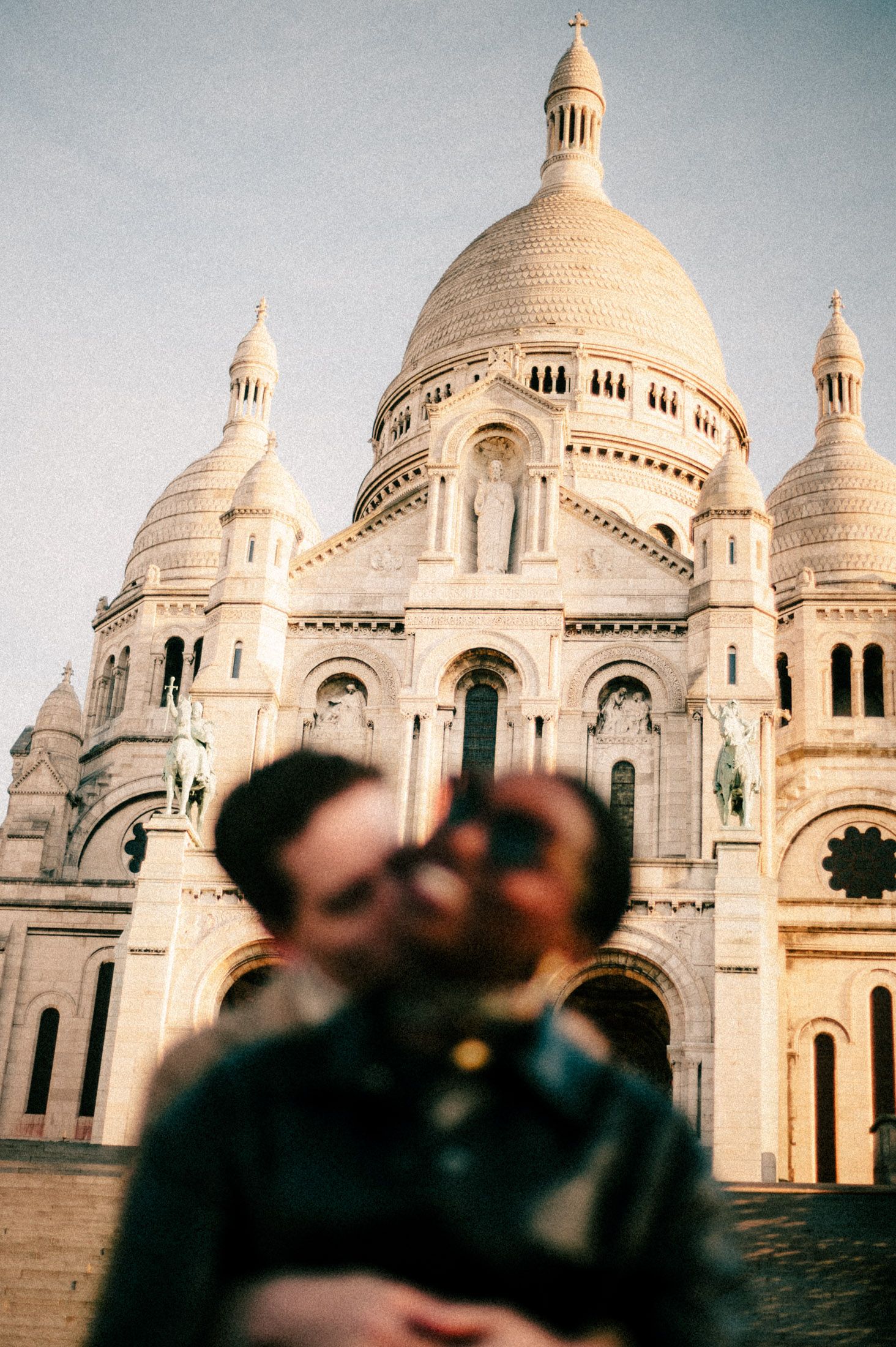 A sequence of photos showing the iconic white domes and architecture of the Sacre-Coeur Basilica in Paris at sunset.