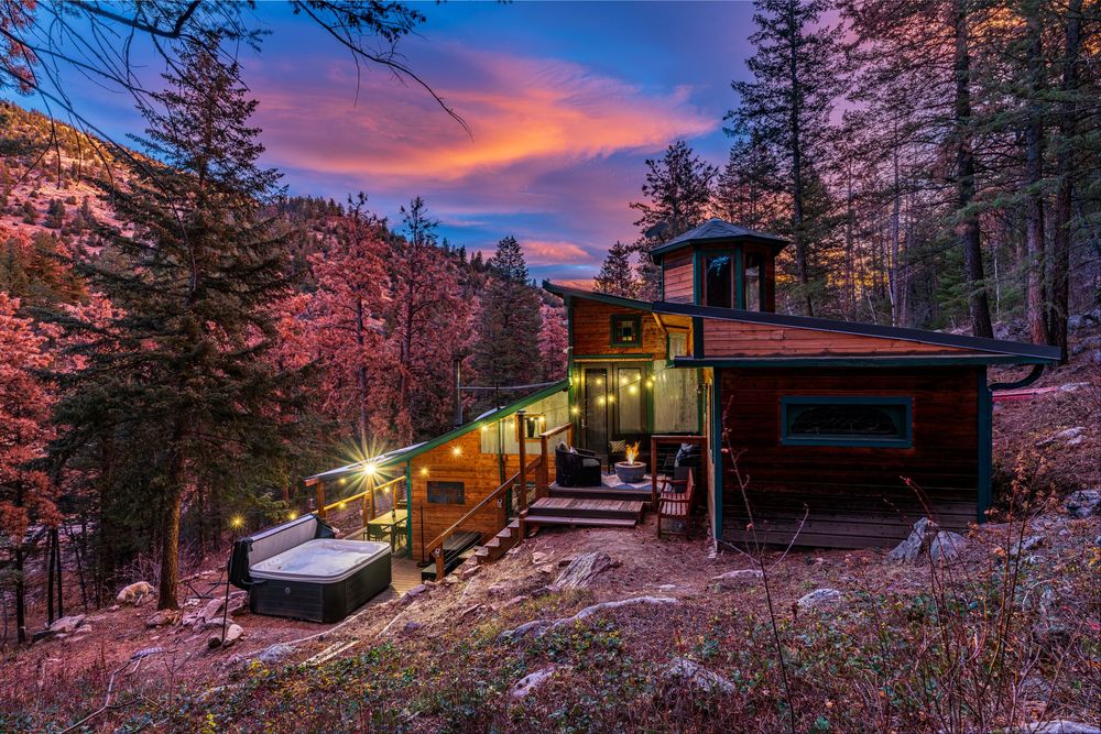 Vibrant sunrise shot of hot tub & firepit by Denver Hospitality, Travel & Tourism photographer Captain Colorado Photography.