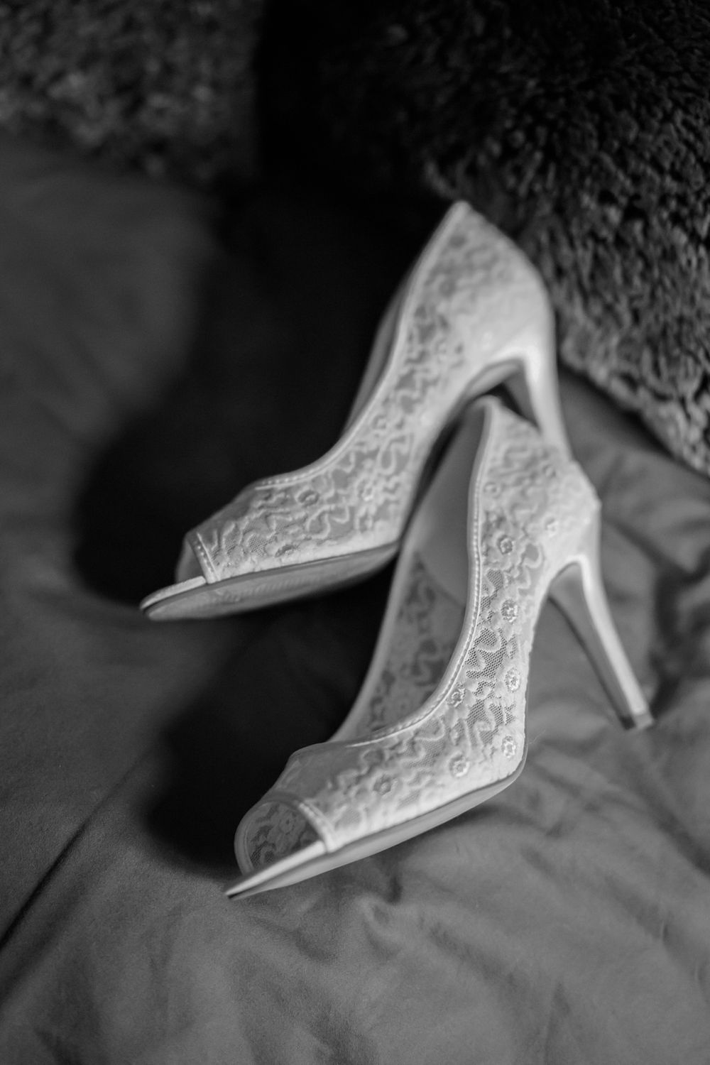 Striking detail photo of wedding shoes.