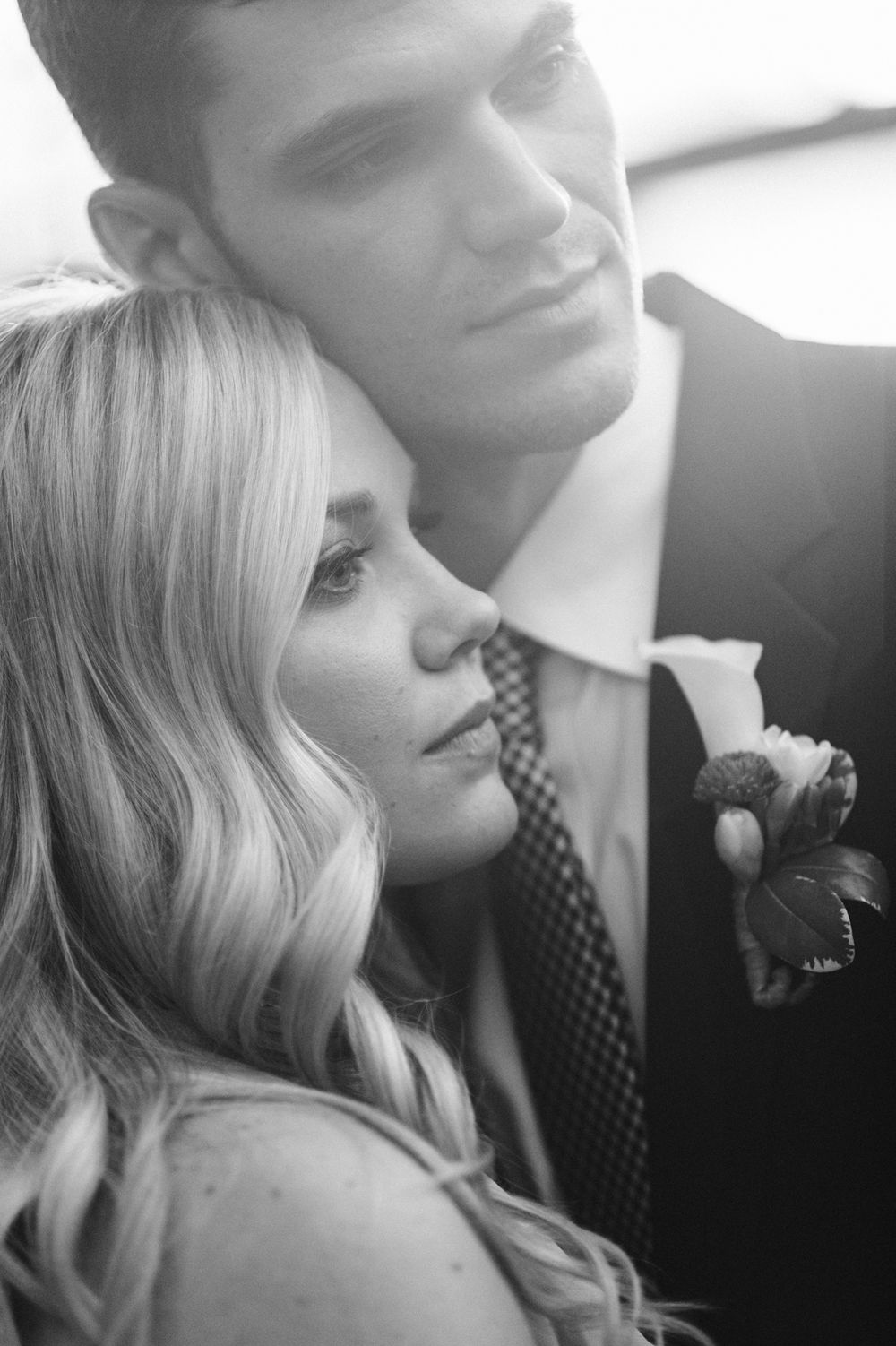 Black and white wedding portrait of bride and groom.