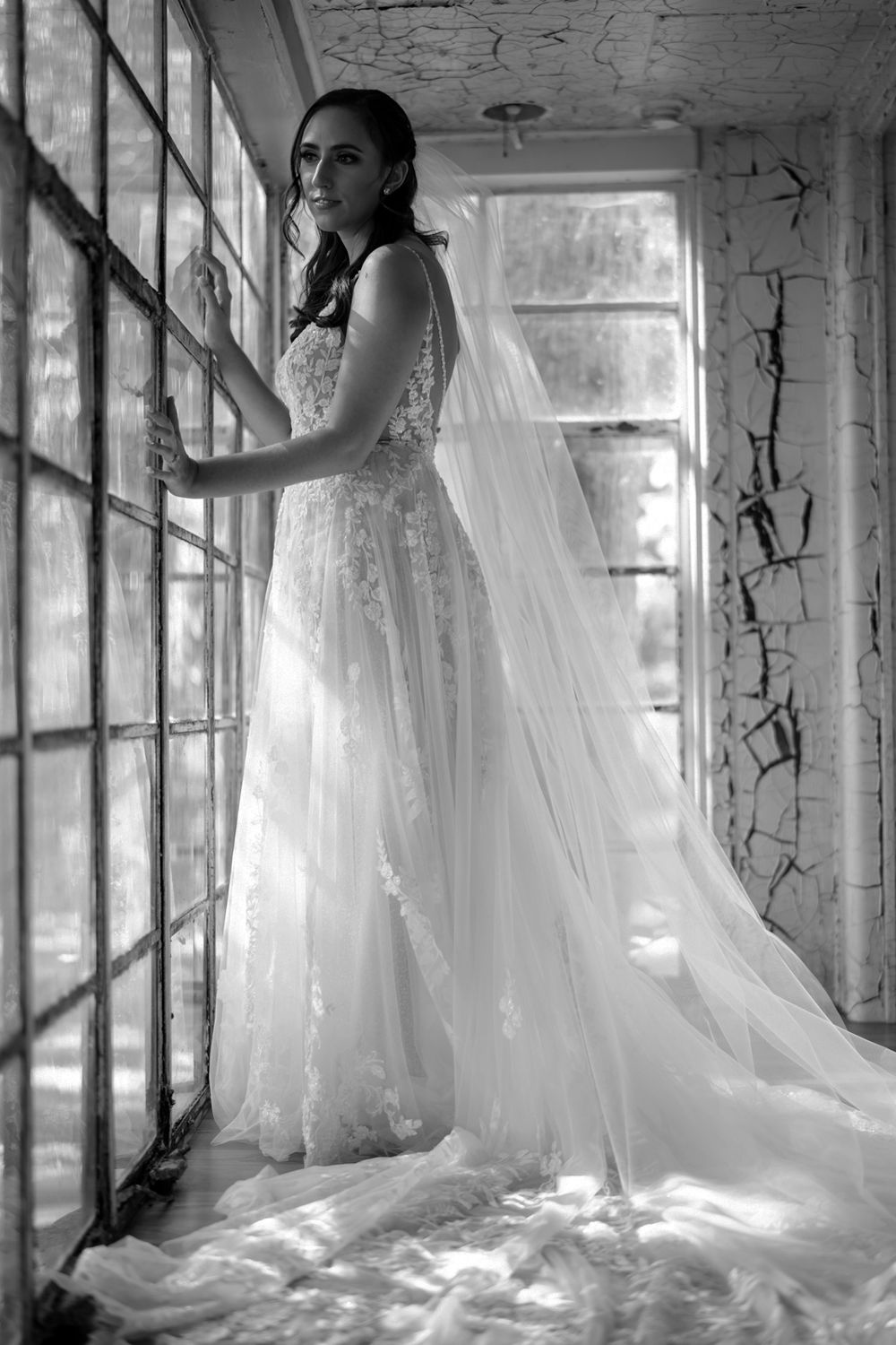 Wedding portrait of bride in a converted train car.