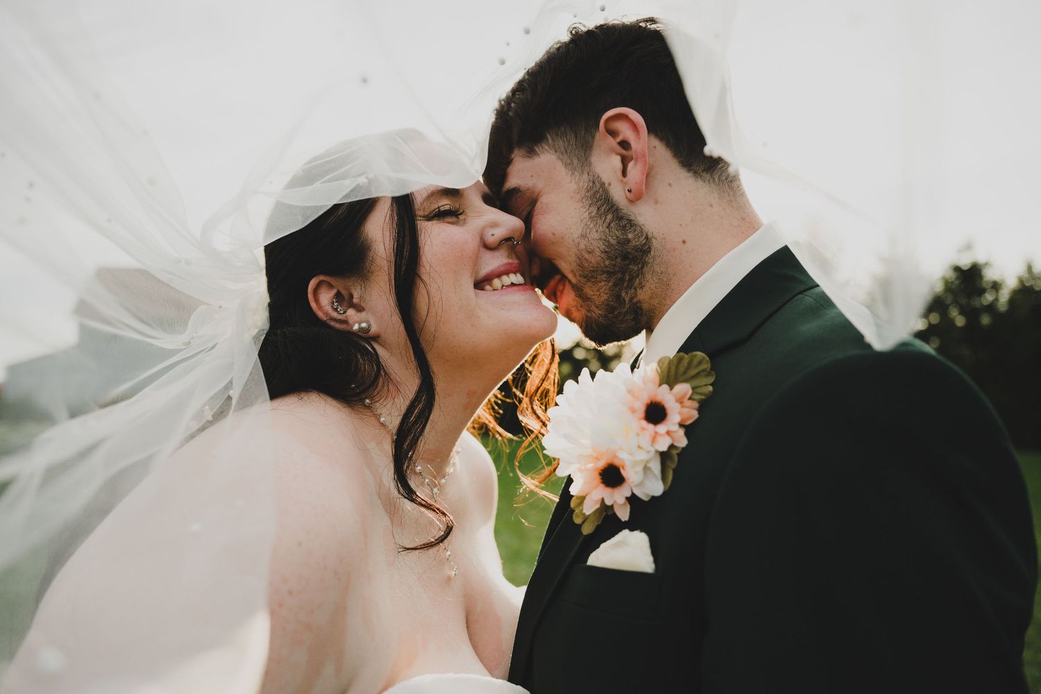 A romantic black and white collage of wedding moments showing couples sharing intimate kisses and embraces.