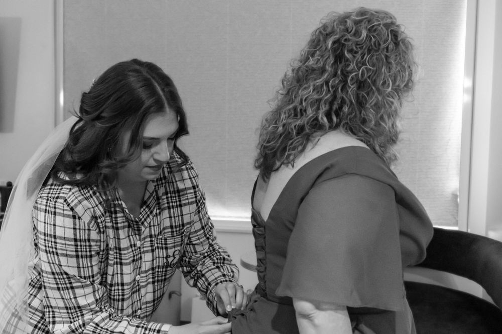 Two people having an intimate conversation in black and white photography.