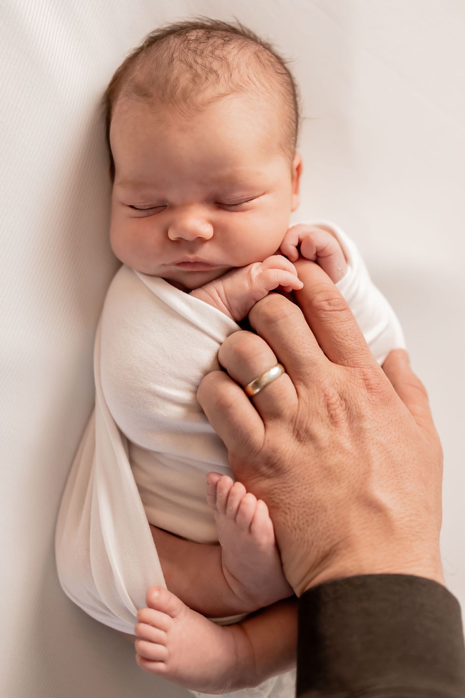 Maternity and newborn photographer in Richmond Virginia offering affordable sessions in studio, outdoors, and in your home.