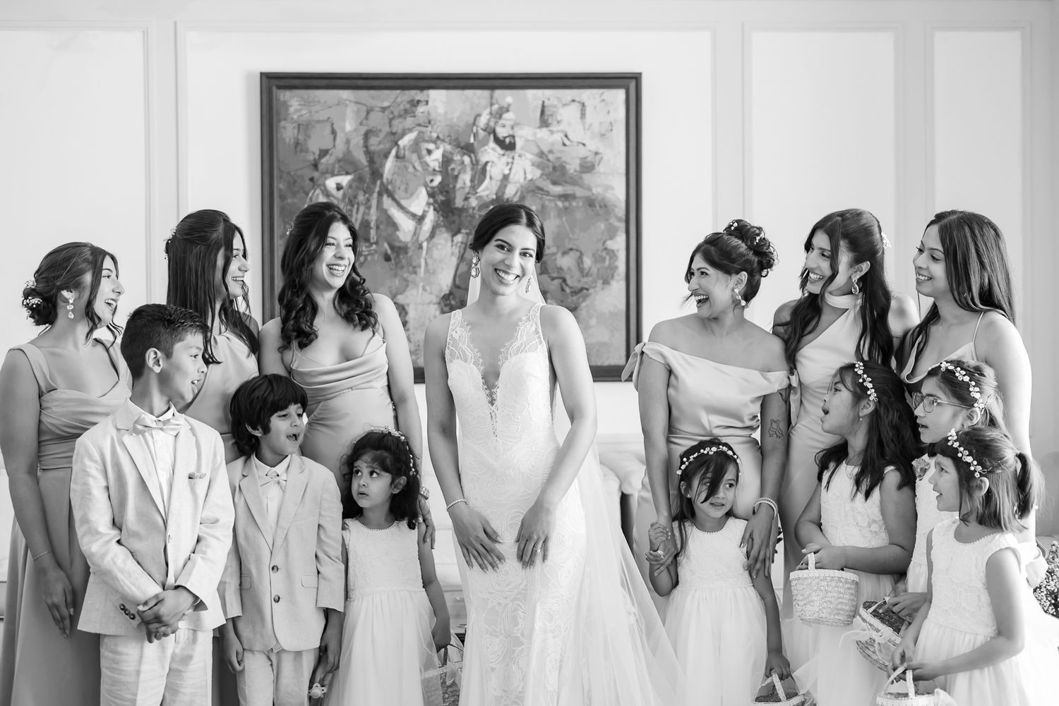 Leah surrounded by her bridesmaids as she gets ready for her wedding ceremony at Tivoli Chattarpur.