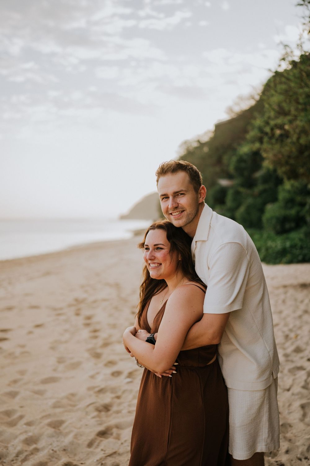 Romantic engagement photoshoot at Samabe Bali with beautiful ocean view backdrop