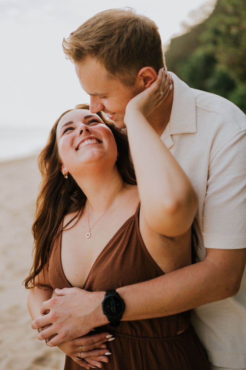 Romantic engagement photoshoot at Samabe Bali with beautiful ocean view backdrop