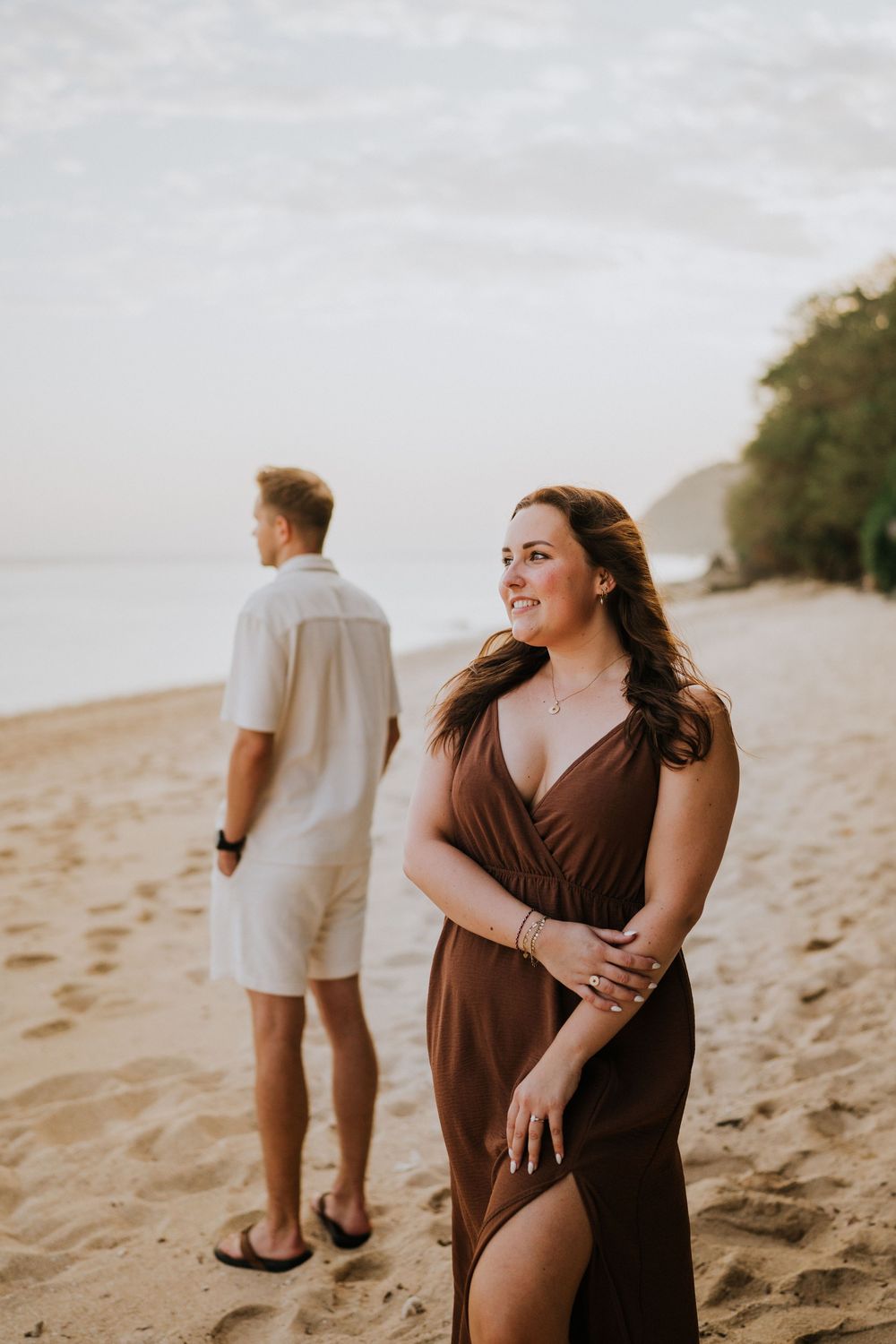 Romantic engagement photoshoot at Samabe Bali with beautiful ocean view backdrop