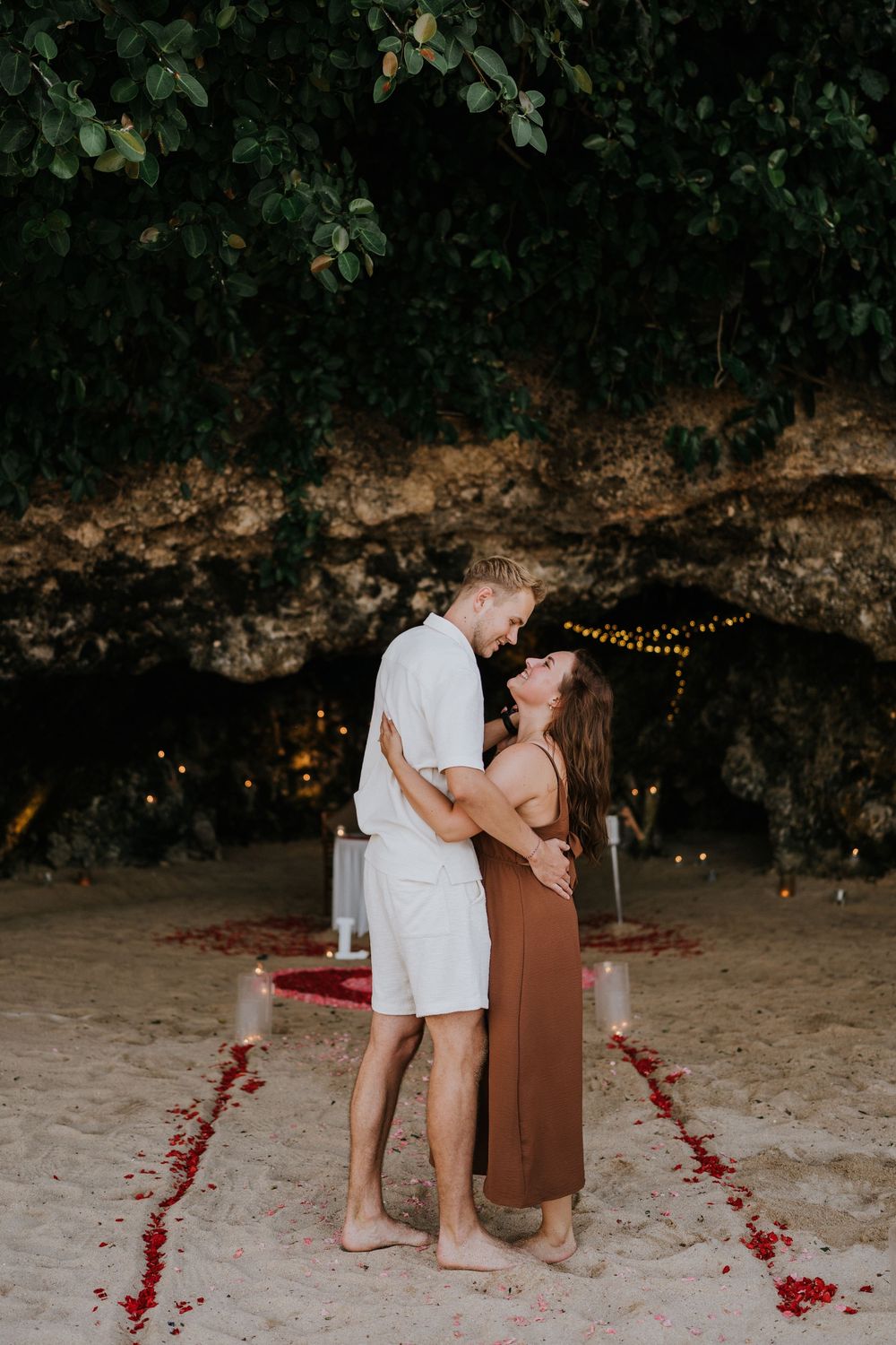 Romantic engagement photoshoot at Samabe Bali with beautiful ocean view backdrop
