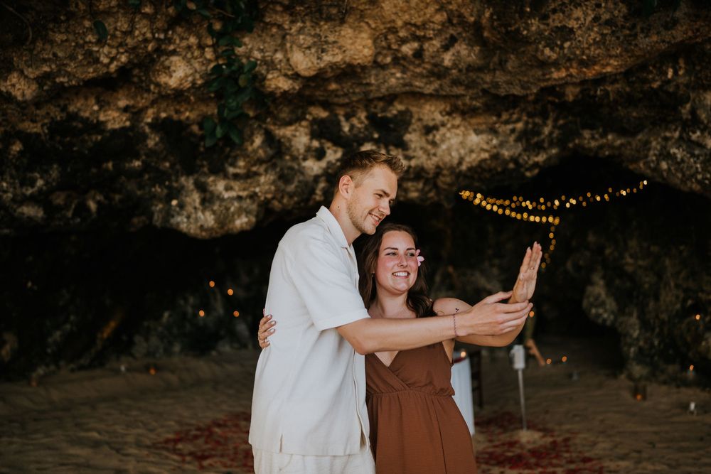 Romantic engagement photoshoot at Samabe Bali with beautiful ocean view backdrop