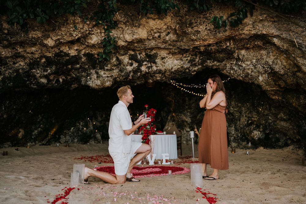 Romantic engagement photoshoot at Samabe Bali with beautiful ocean view backdrop