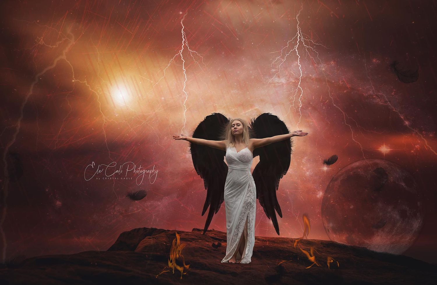 A fantasy portrait with black wings against a lightning-filled sky.