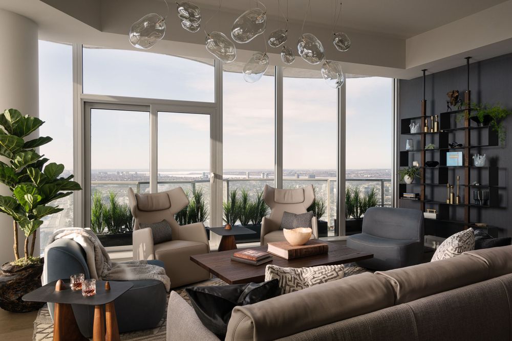 Modern luxury high-rise apartment living room with panoramic windows, gray sectional sofa and contemporary decor.