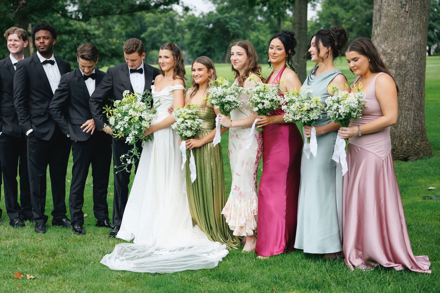 Summer wedding party in Forest Park in St. Louis Missouri. Wedding photography by Faith's Flicks. Now booking 2026& 2027 weddings.