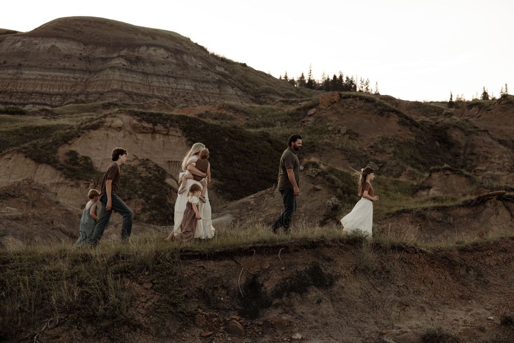 a family explore the badlands of alberta during a family photoshoot
