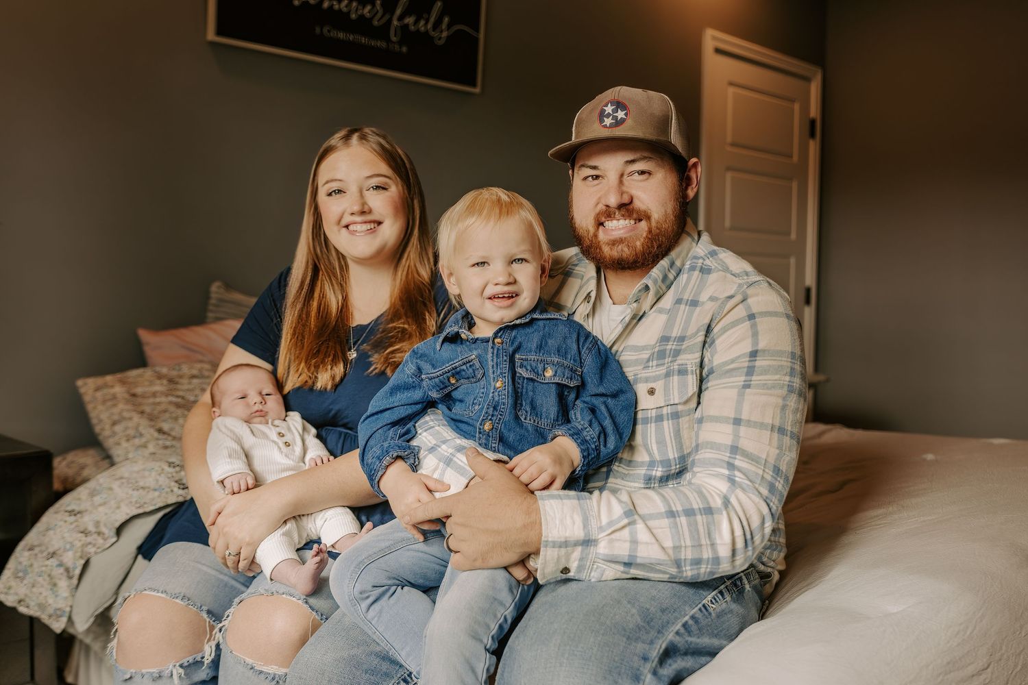 Candid family lifestyle photography session with relaxed poses on bed.