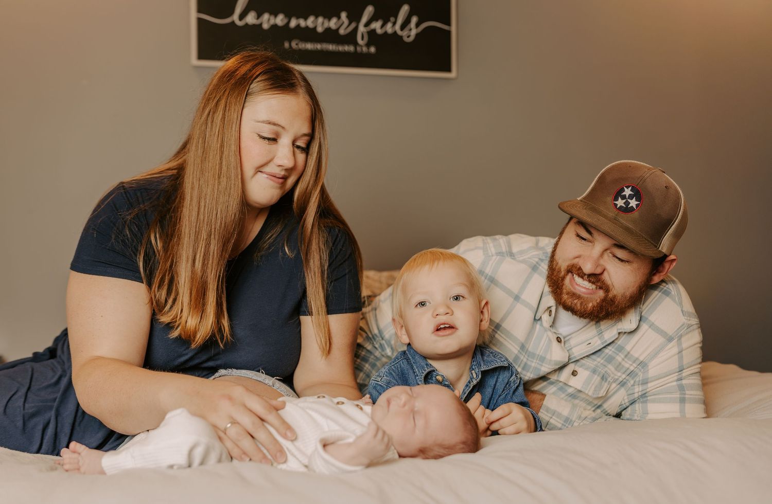 Panoramic view of family lifestyle session with warm tones and natural interactions.