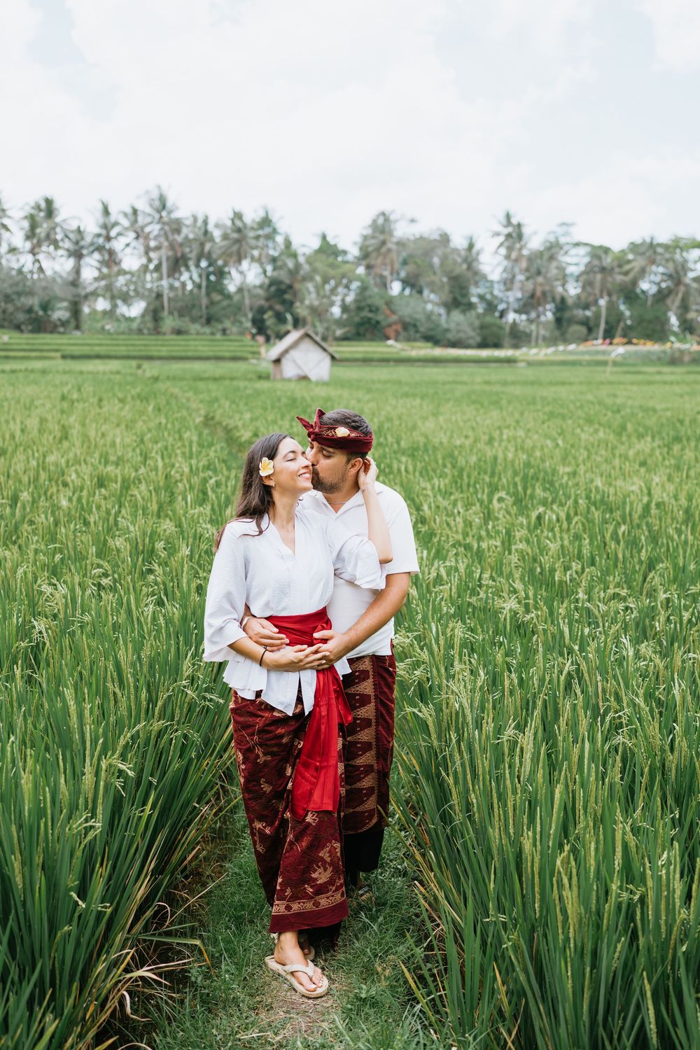 Bali couple photoshoot with ricefield and waterfall background