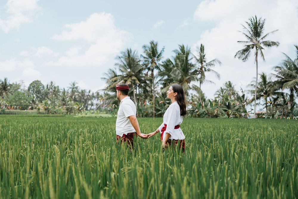 Bali couple photoshoot with ricefield and waterfall background