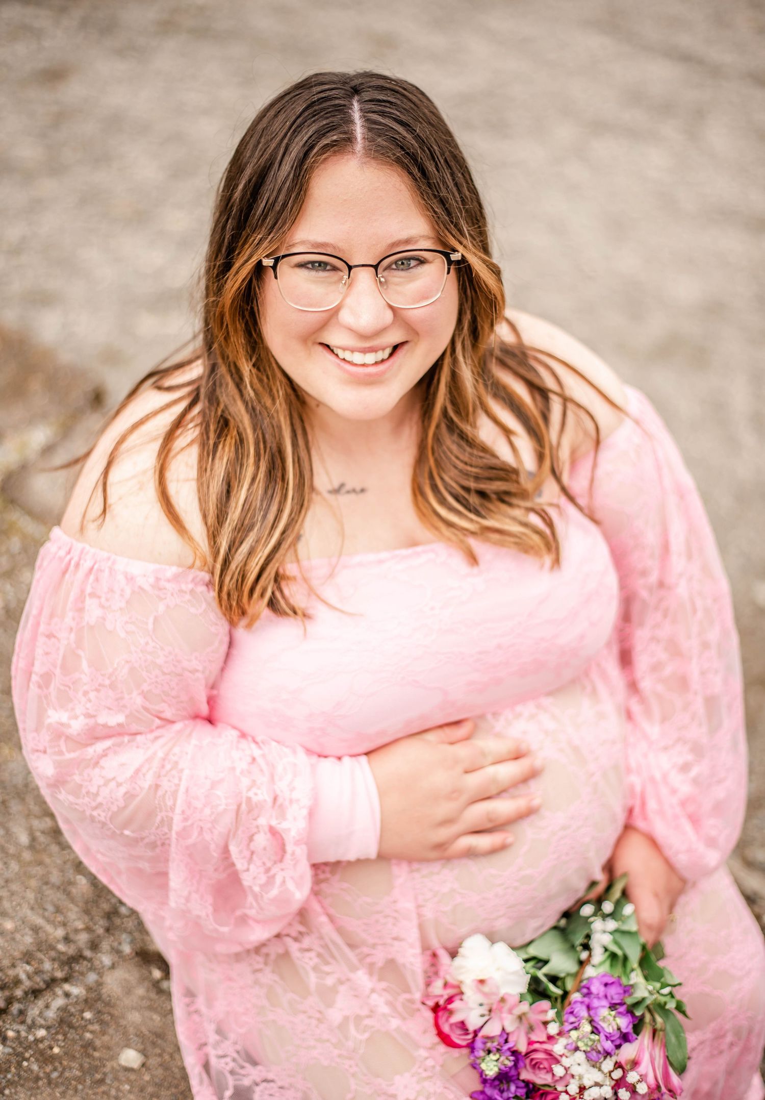 A series of outdoor portraits featuring someone in a pink dress holding colorful flowers against a neutral backdrop.