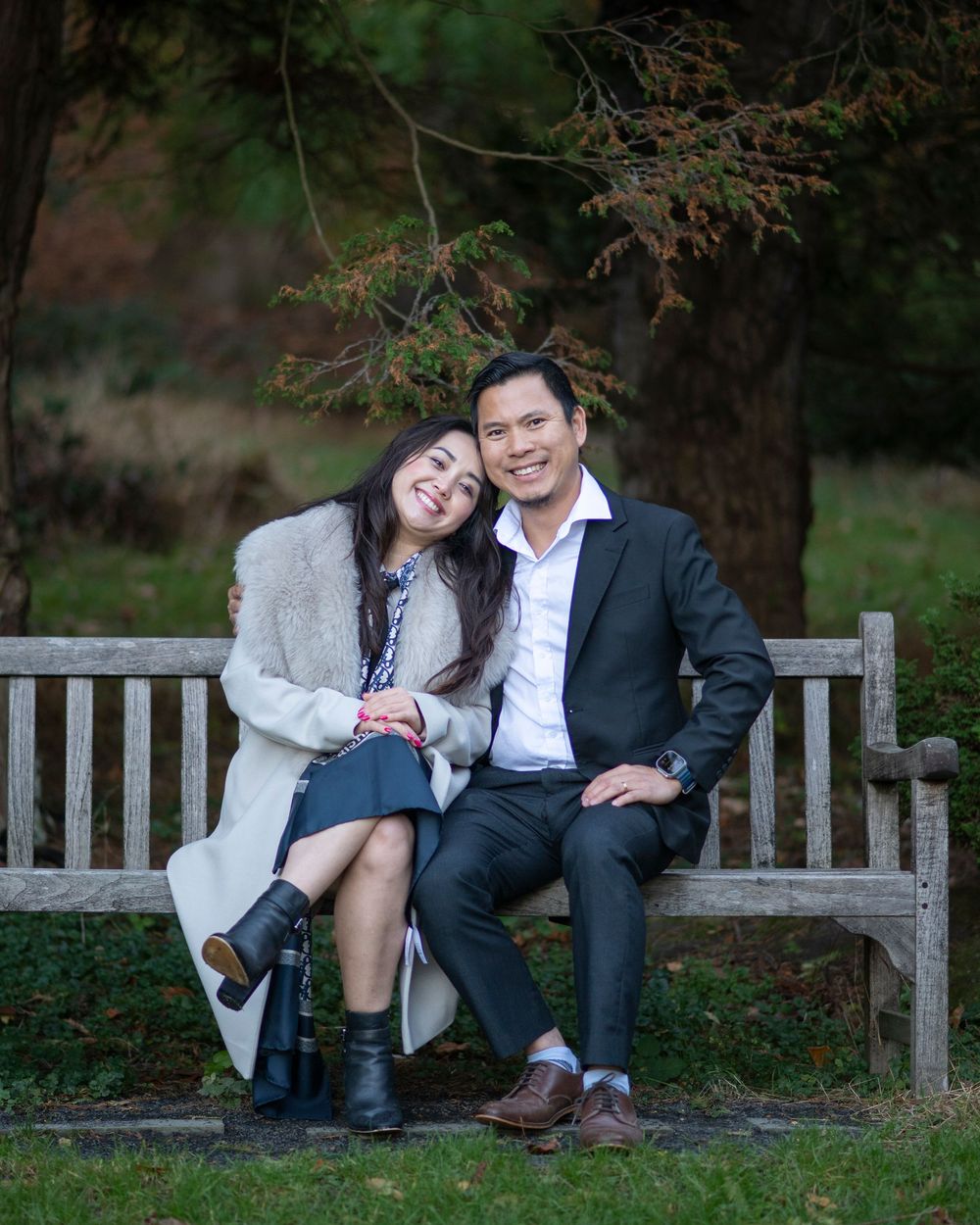 couple photo sitting on bench in holmdel park nj