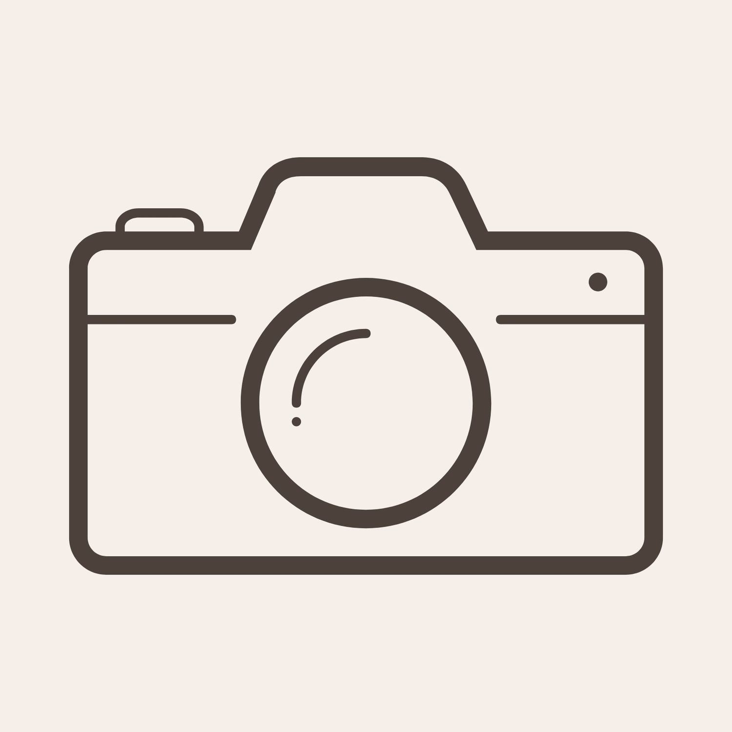 Simple icon of a camera shown in dark silhouette against light background.