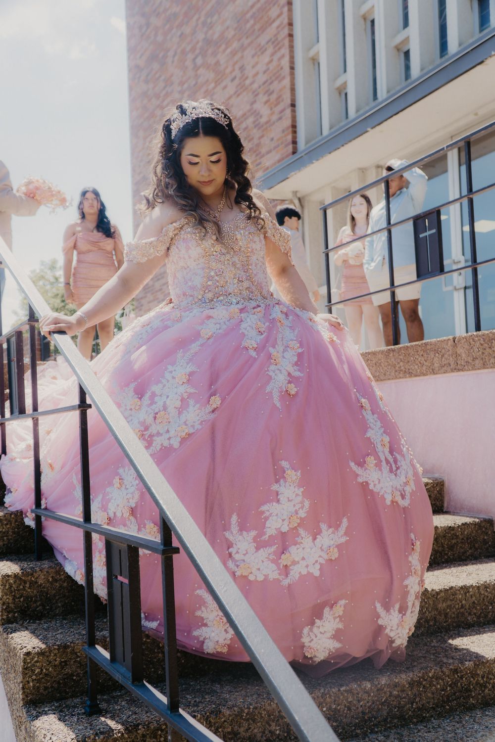 Quinceañera walking down stairs, iglesia catolica oak ridge st. mary