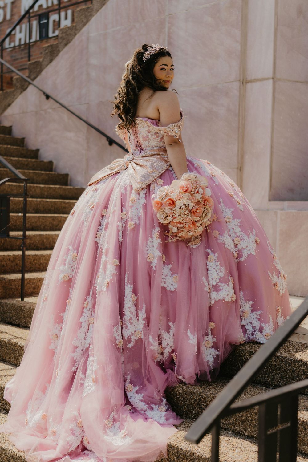 Quinceañera twirling in ballgown, candid movement shot