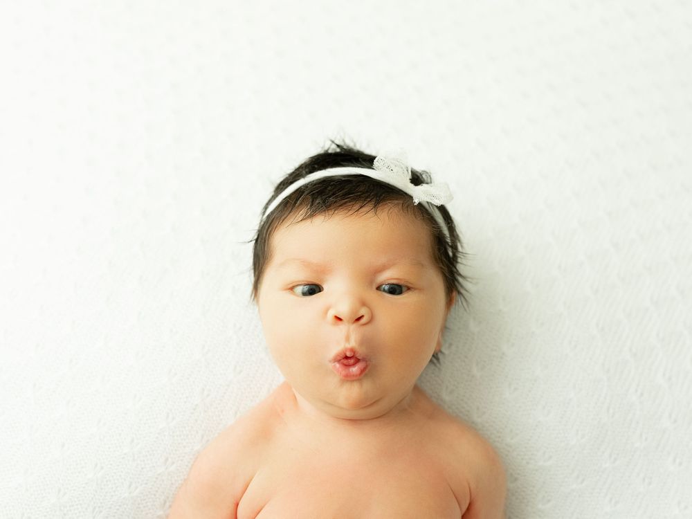 Four bright photos showing sweet facial expressions and playful reactions against a white background.