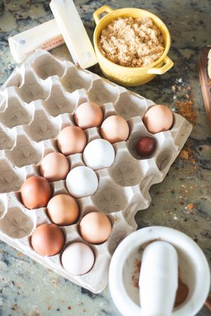 product photography flatlay of eggs, cinnamon, and butter