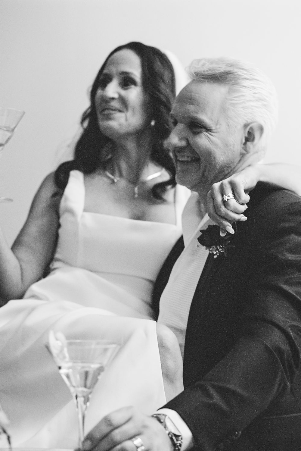 A tender and joyful black and white wedding sequence showing intimate moments between a couple during their celebration.