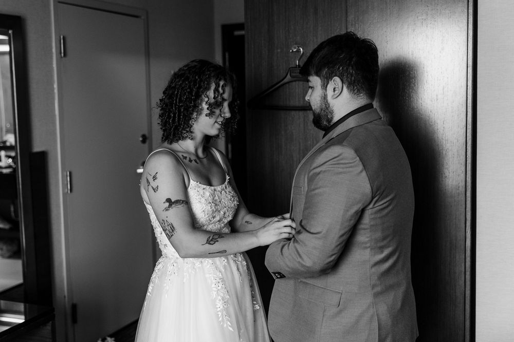 A romantic black and white wedding photo sequence showing the newlyweds dancing together at their reception.