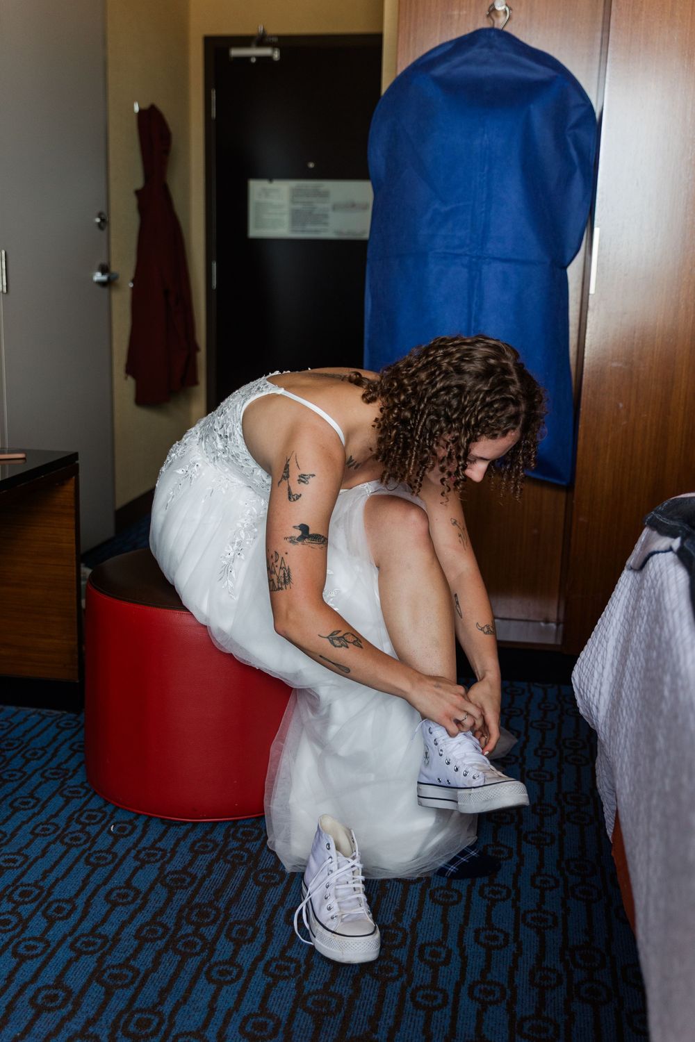 A series of photos showing someone in a wedding dress bending down to adjust their white high-top sneakers.