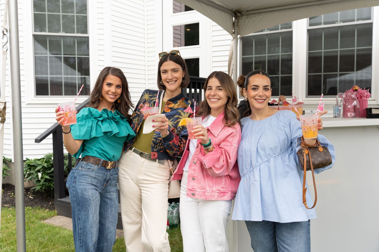 Group of guests mingling at an outdoor party