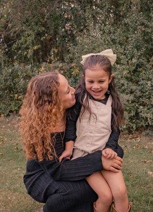A heartwarming sequence of candid outdoor moments showing playful interaction and laughter against a natural backdrop.