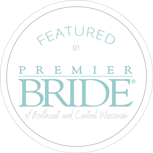 A circular logo for Premier Bride magazine of Northeast and Central Wisconsin in soft turquoise and gray text.