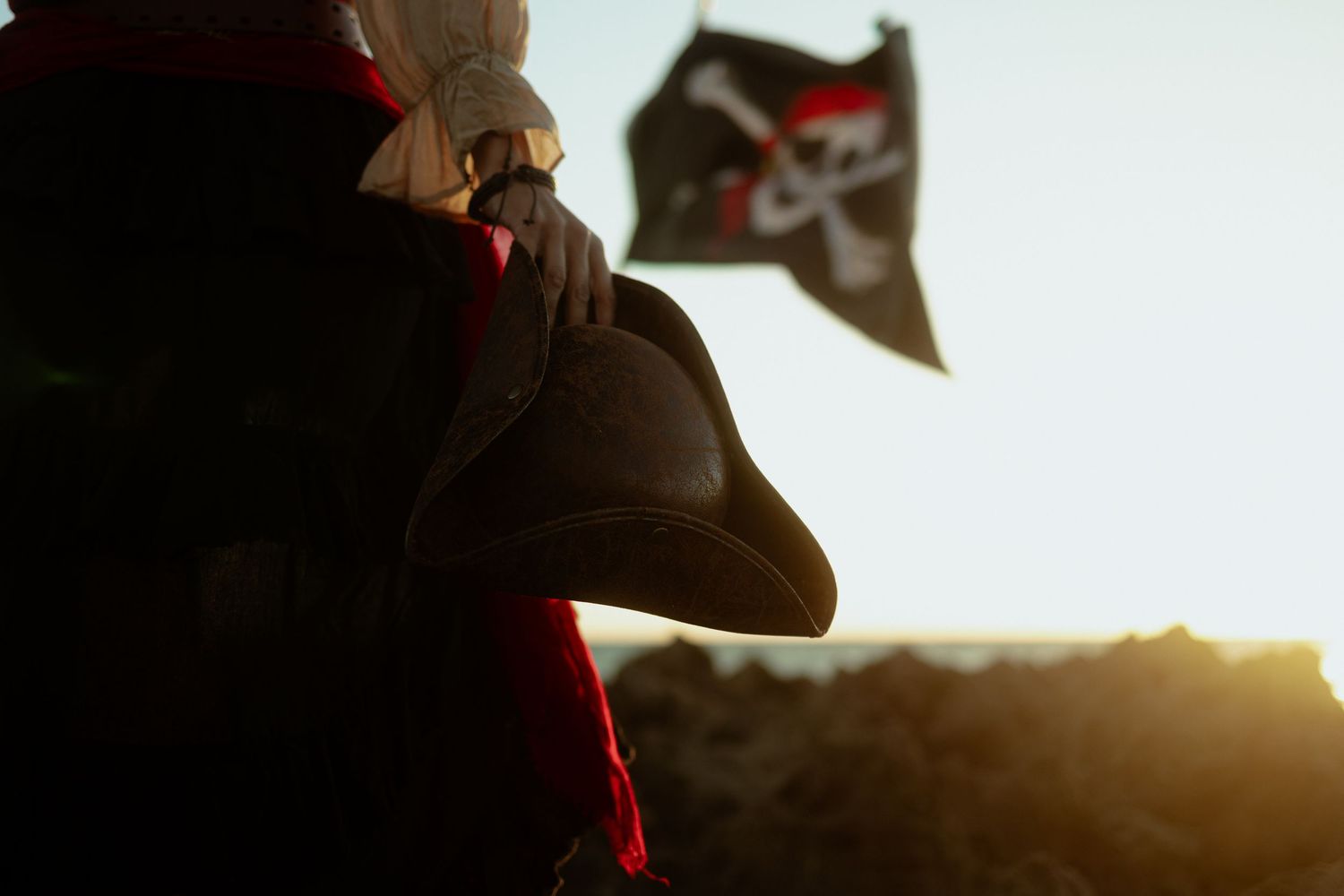 Creative cinematic pirate-inspired portrait at sunset in South Florida. Styled shoot perfect for Pinterest boards + themed events.