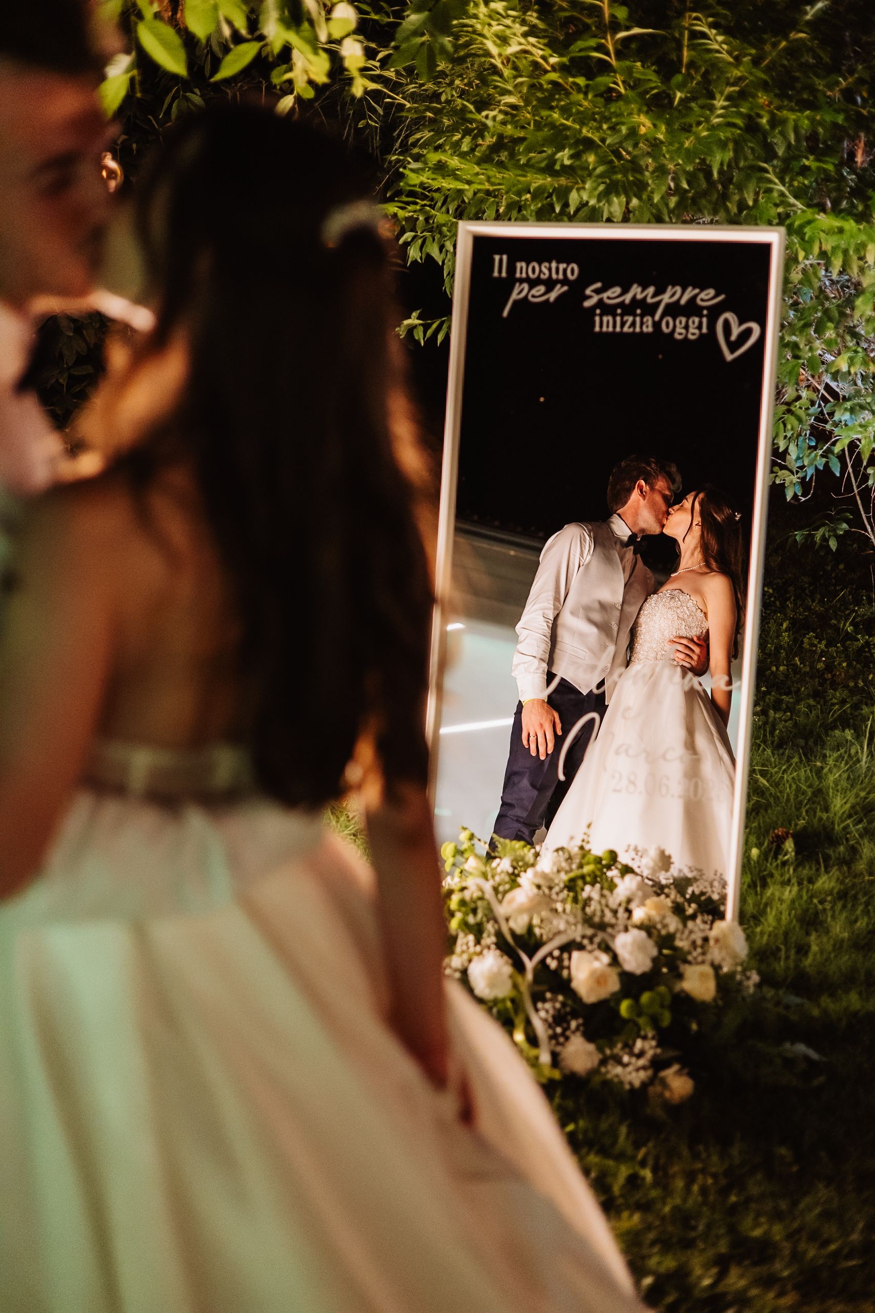 A series of romantic wedding album photos displayed in sequence showing tender moments between a couple in an outdoor setting.