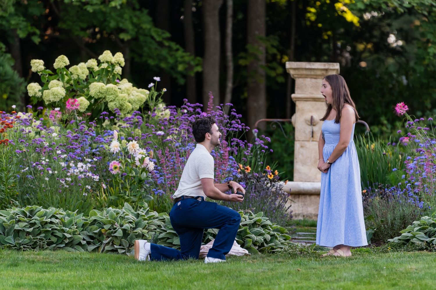 Romantic engagement photography with wildflowers in Rhode Island