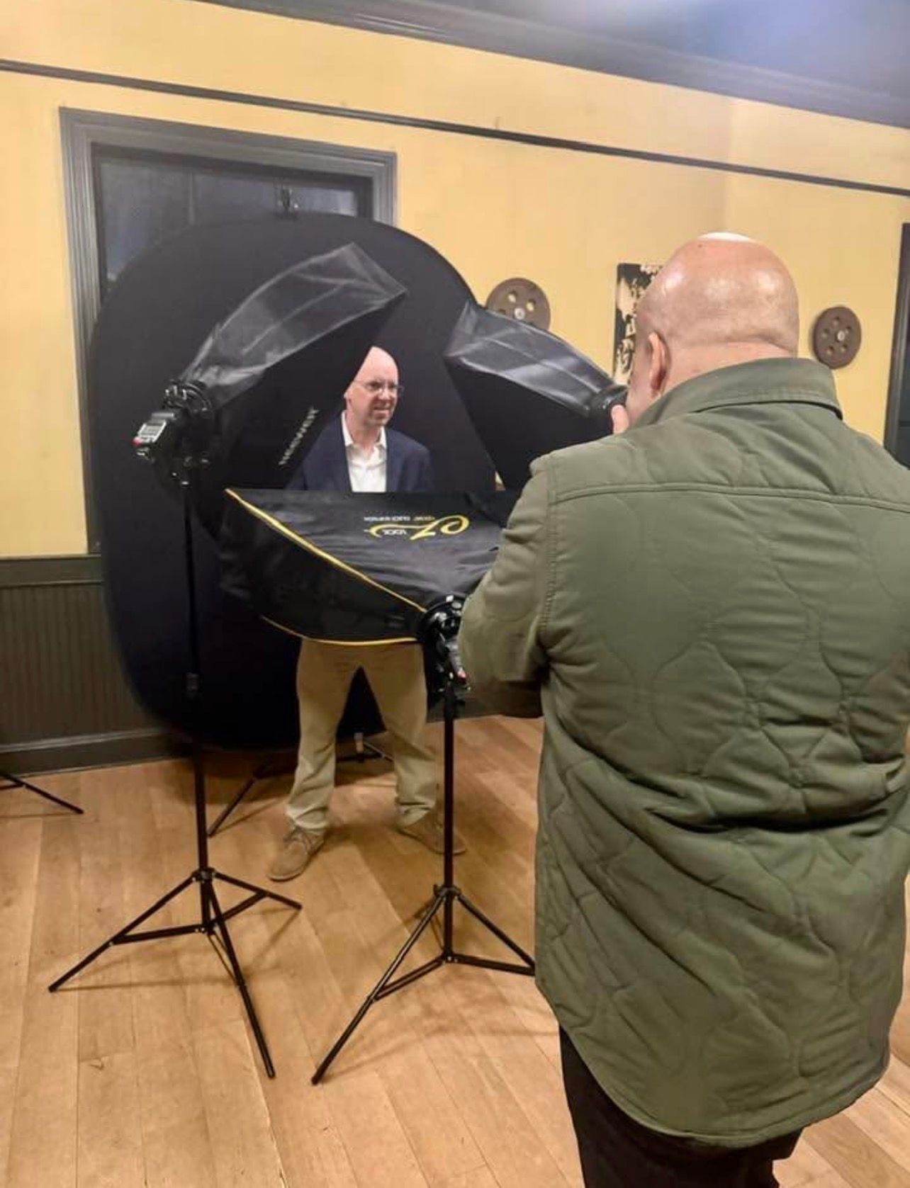 Kent Daniel capturing executive headshot in modern studio setting | Montclair headshot photographer