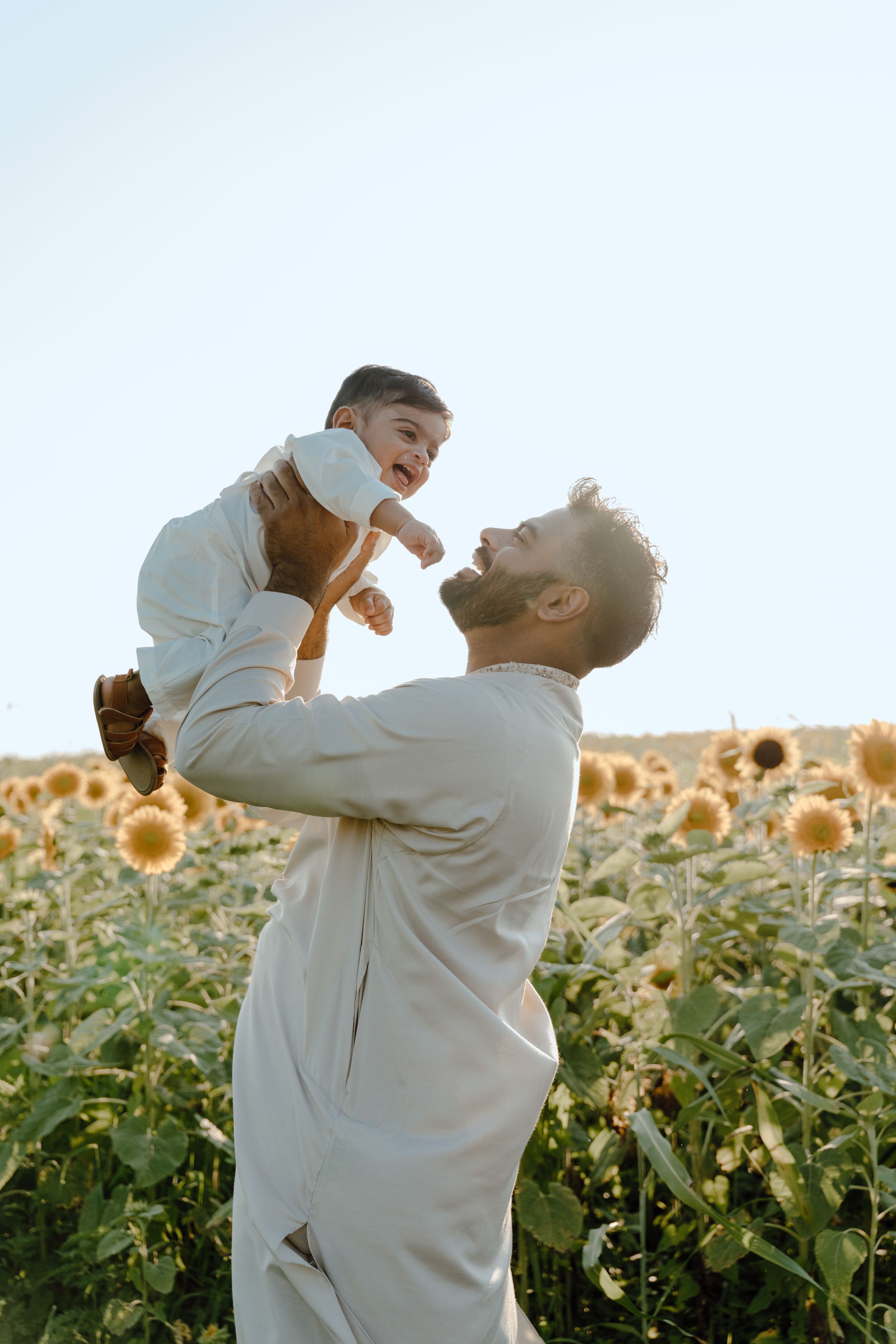 Lifestyle family photography focused on natural interaction, movement, and real moments between parents and children at burnside farms