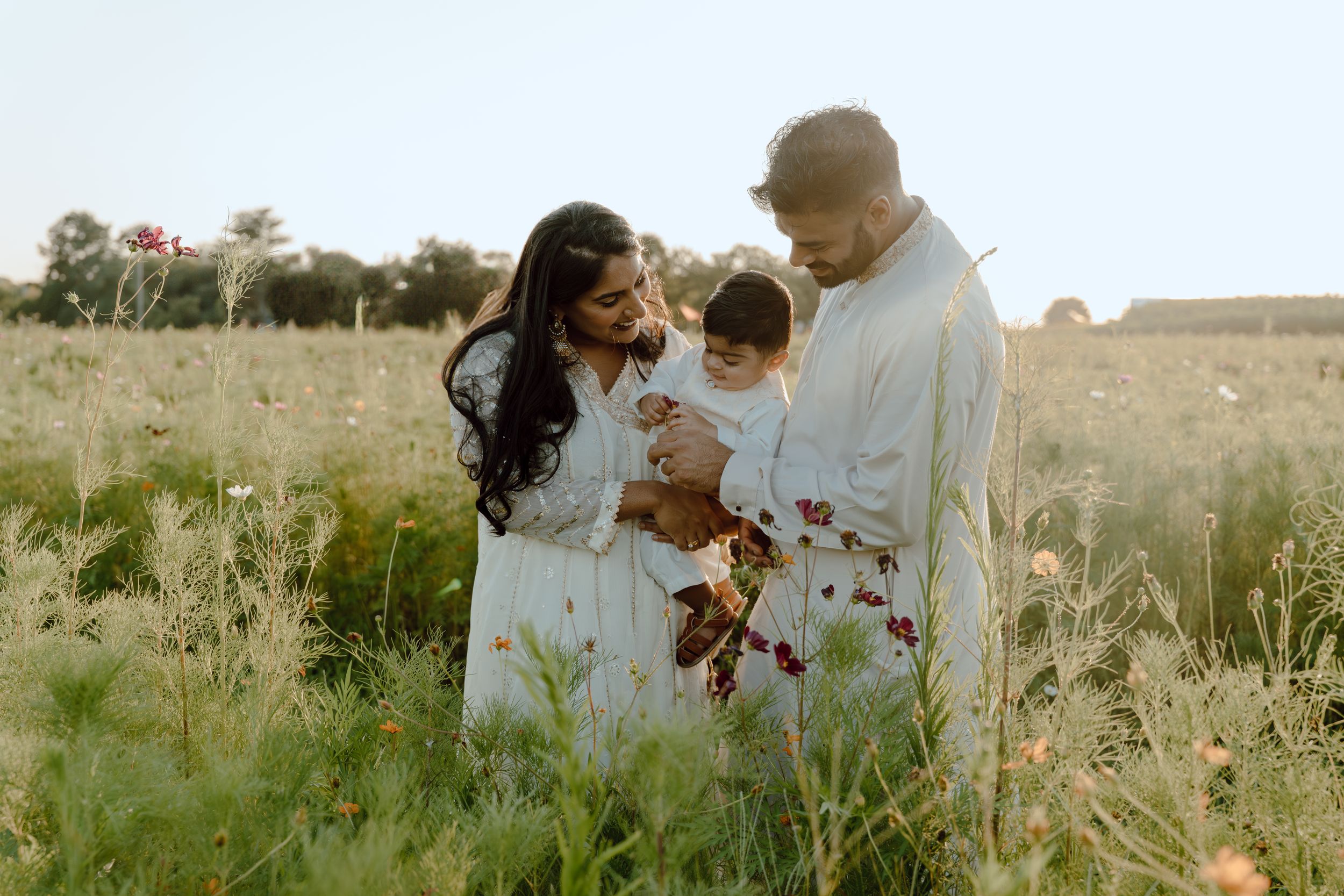 Lifestyle family photography focused on natural interaction, movement, and real moments between parents and children at burnside farms
