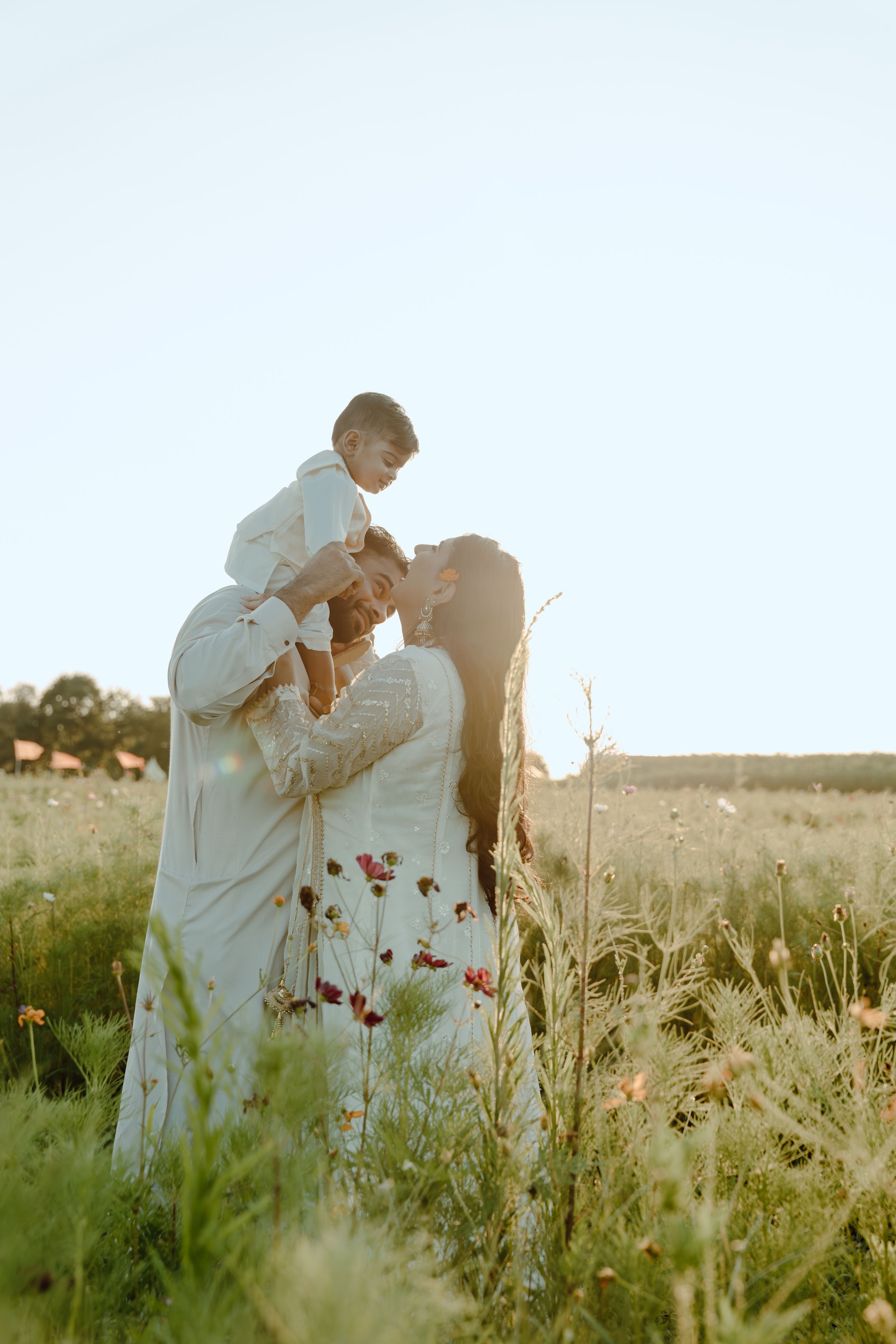 Lifestyle family photography focused on natural interaction, movement, and real moments between parents and children at burnside farms