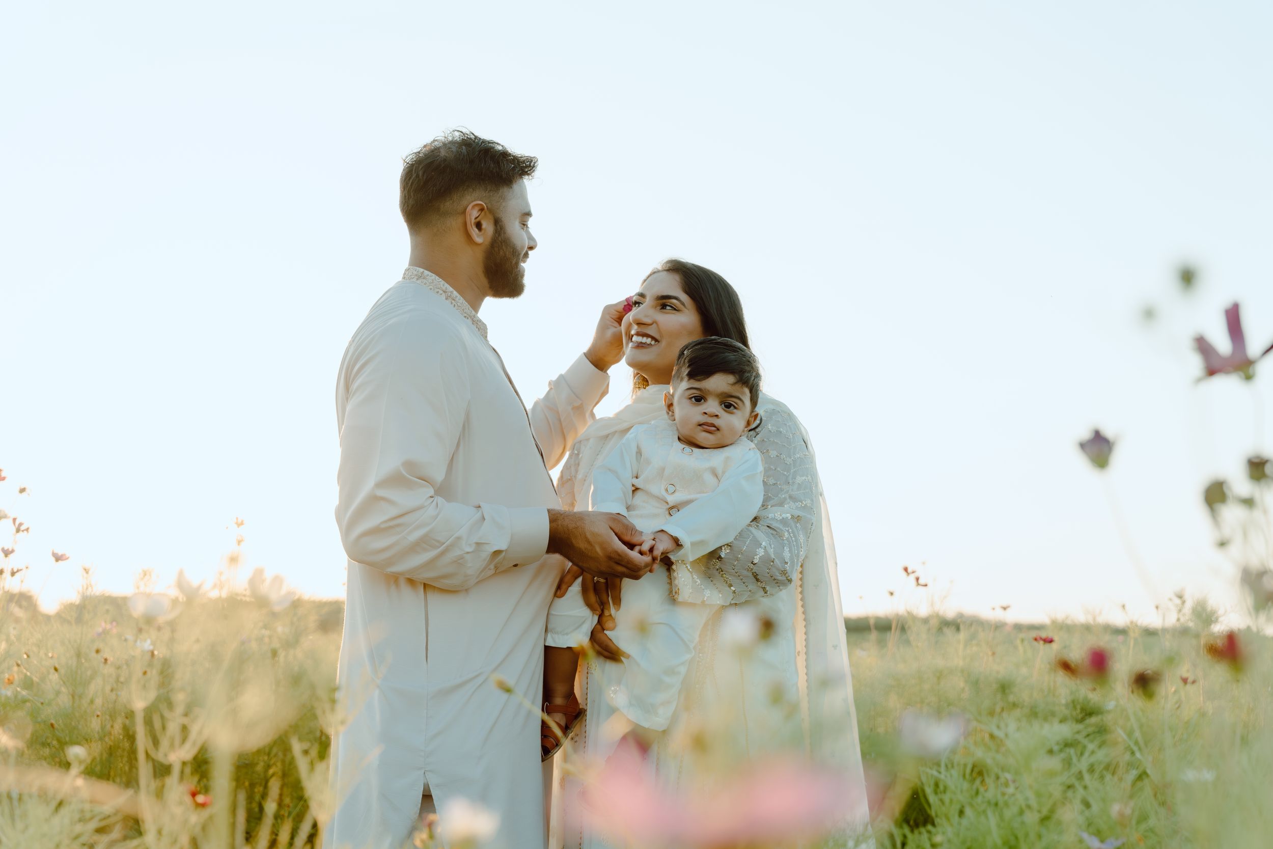 Lifestyle family photography focused on natural interaction, movement, and real moments between parents and children at burnside farms